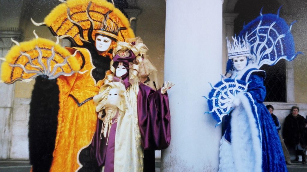 Best carnivals in Venice with people wearing beautiful and colourful costumes