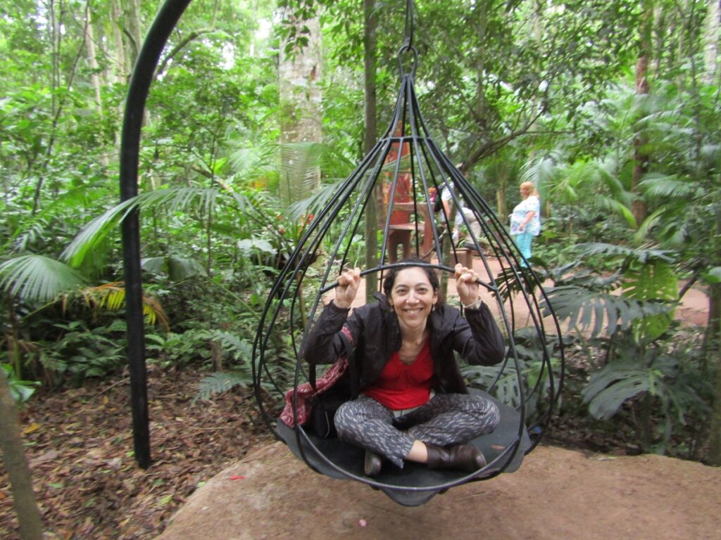 Ella in a bird's cage at the Birds Park